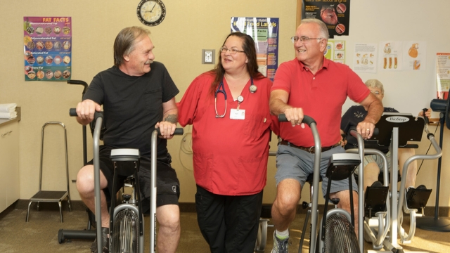 stationary biking with physical therapist